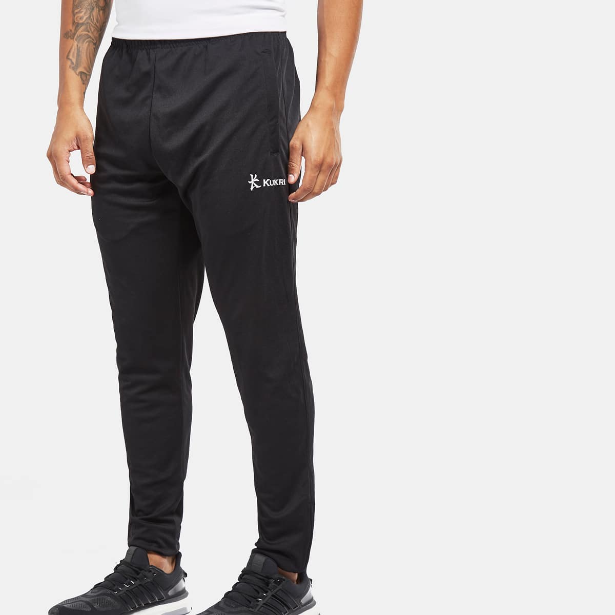 Kukri black Retro tapered track pants – Uniform Store NI